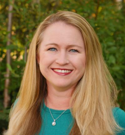 Outdoors headshot photo of Dr. Megan Carr