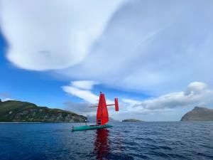 The Saildrone Surveyor departing Dutch Harbor, Alaska, after the mid-project pit stop. Image courtesy of Saildrone Inc.  