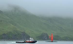 The Saildrone Surveyor in Alaska’s Dutch Harbor at the beginning of the Aleutians Uncrewed Ocean Exploration expedition. Image courtesy of Saildrone Inc.  