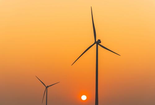 Electricity windmill on sunset sky in the evening