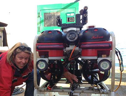Ann conducts a pre-launch inspection of a remote operated vehicle (ROV) during one of her many field surveys.