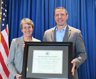 Brian Jordan receives Historic Preservation Award fr Sec Jewell Brian Jordan receives Historic Preservation Award fr Sec Jewell